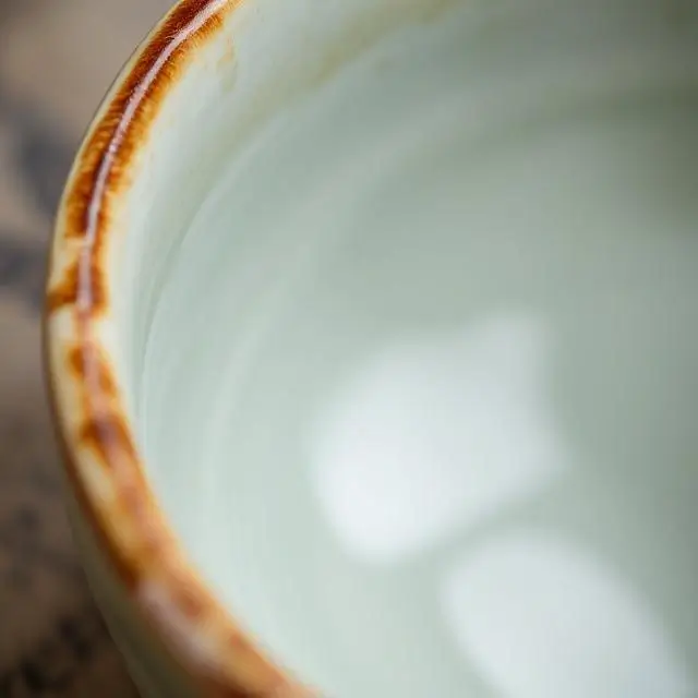 Artistic close-up of a glazed ceramic bowl