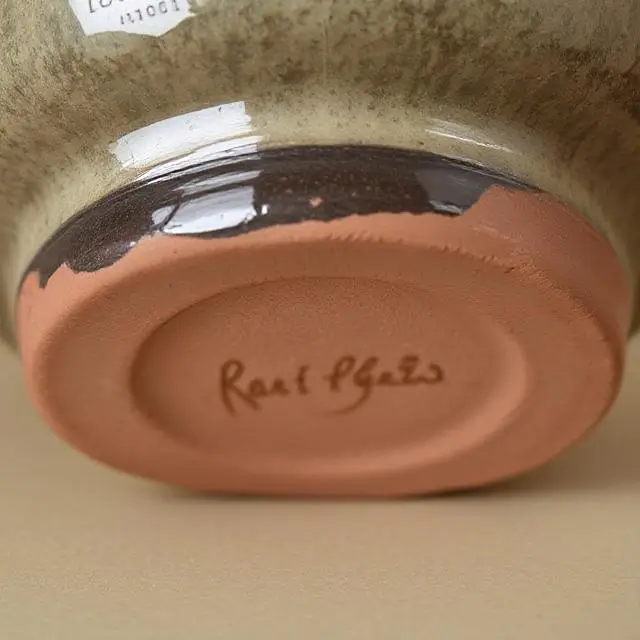 Detail of the potter's signature on the base.